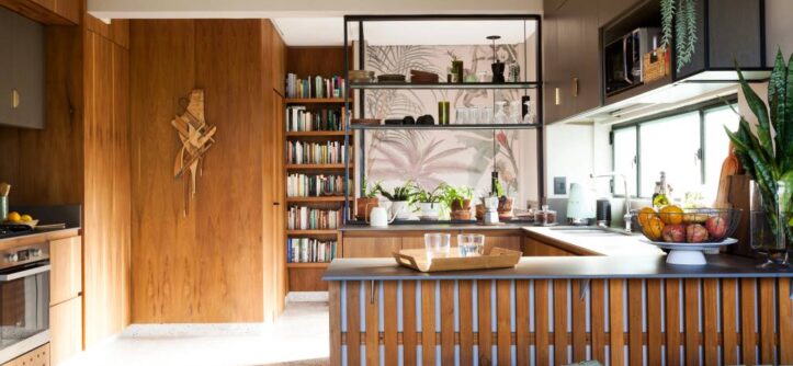Stainless steel dumbwaiter installed in a modern townhouse kitchen