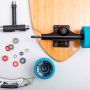Skater cleaning skateboard bearings for smoother performance