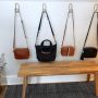 Compact crossbody purse with organized compartments for essentials