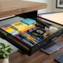 Clean minimalist wooden desk setup with organized office supplies.