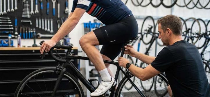 Cyclist adjusting saddle before long Boulder ride