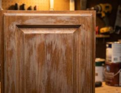 Muddy cabinet finish caused by grease and humidity in Austin kitchen