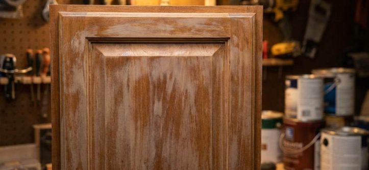 Muddy cabinet finish caused by grease and humidity in Austin kitchen